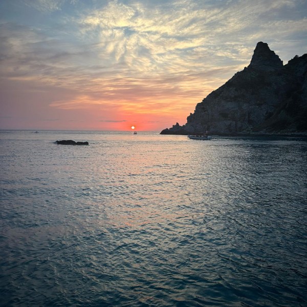 a sunset over a body of water